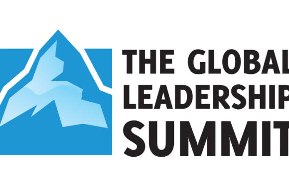 A stylized mountain logo with the text "The Global Leadership Summit" beside it. The mountain is in shades of blue and black lines outline its edges.