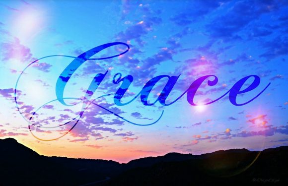 A sunset sky with pink, purple, and blue clouds over silhouettes of mountains, with the word "Grace" written in elegant, cursive font across the image.