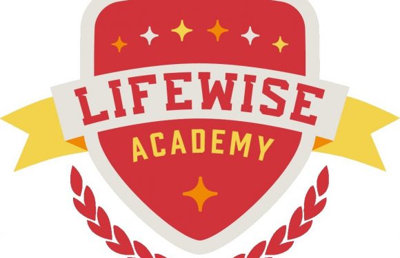 A logo featuring a shield with "Lifewise Academy" written inside, a yellow banner on each side, and a red and yellow star pattern above.