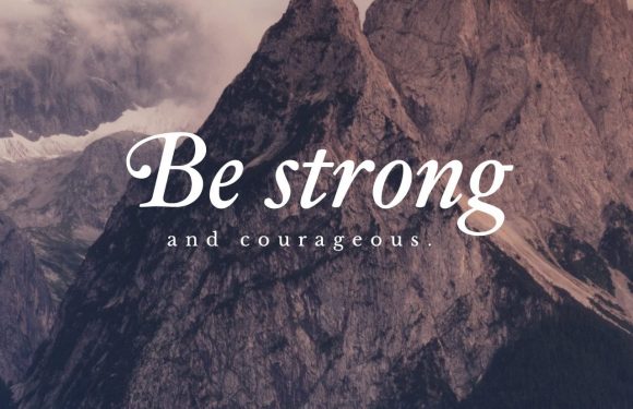 A mountainous landscape with a quote overlaid: "Be strong and courageous." Bible reference: Joshua 1:9. The sky is cloudy with a glow near the horizon.