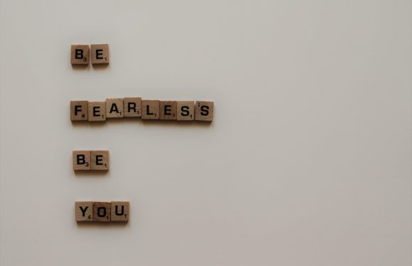"Letters arranged to spell 'BE FEARLESS'S BE YOU' on a plain background, with the words 'BE' appearing twice and separated by spaces."