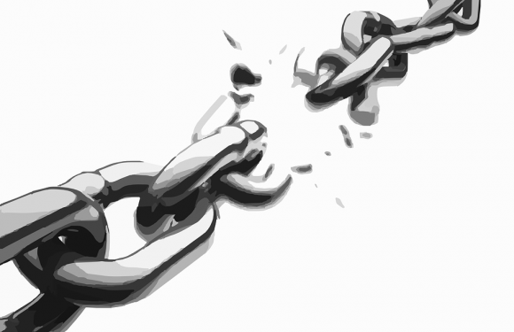 A broken chain link with a shattered appearance, depicted in grayscale, with a transparent background.