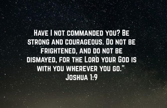 Night sky filled with stars with a mountain silhouette at the bottom. Overlaid text shares a Bible verse from Joshua 1:9 encouraging strength and courage.