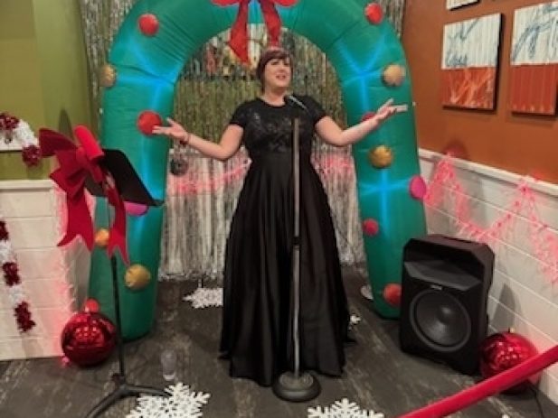 Singer performing at Make-A-Wish Gift event