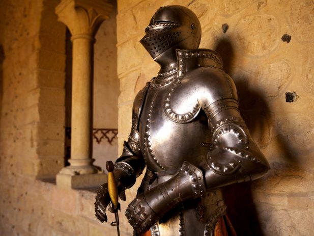 Suit of Armer standing in a hallway