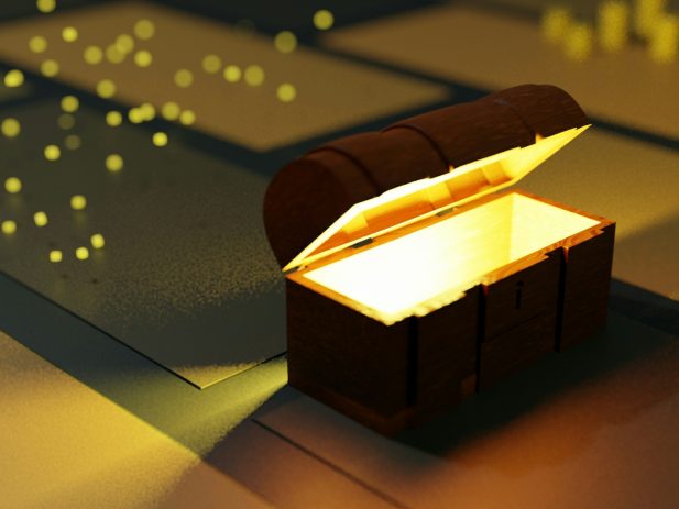 Open treasure chest with light coming out.