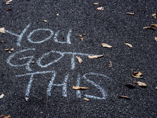 chalk on the sidewalk saying "you got this"
