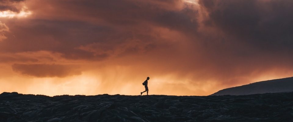 Person running on the horizon.