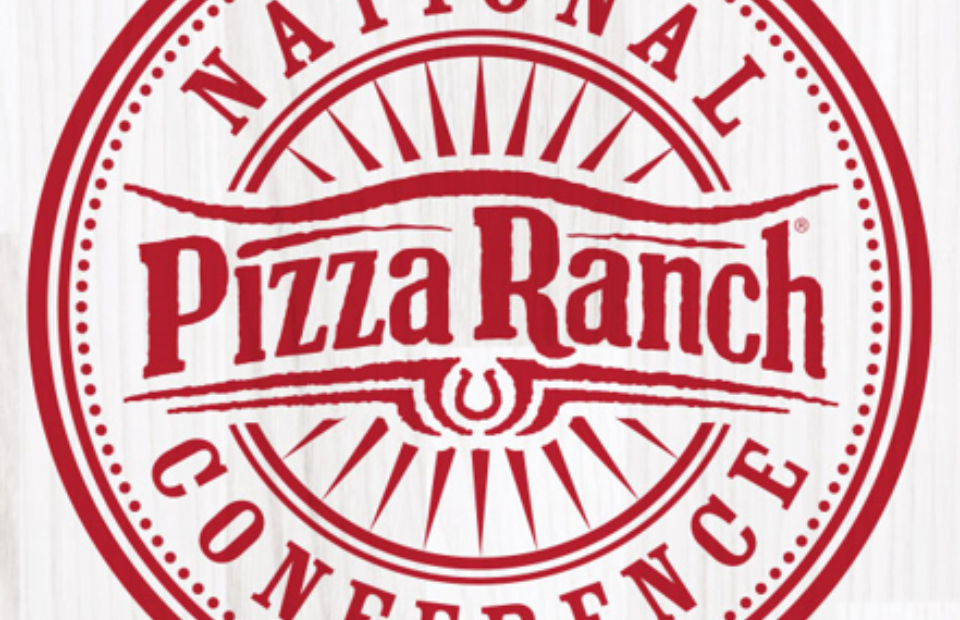 A circular red and white logo with "National Conference" around the top and bottom, and "Pizza Ranch" in the center, with stylized lines and sunburst design.