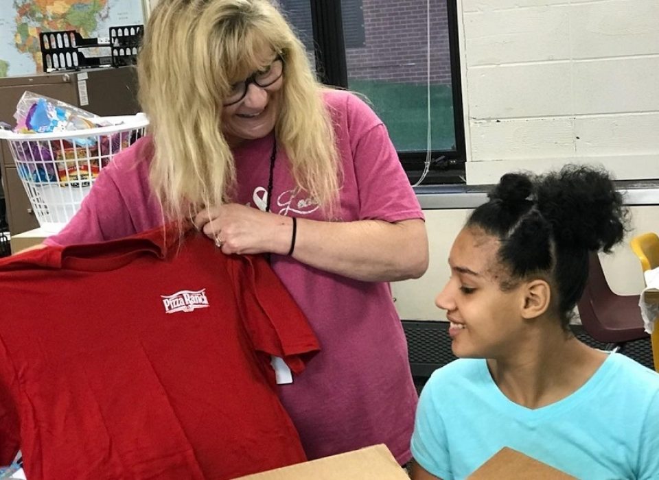 Guest receives package from Pizza Ranch Support Center