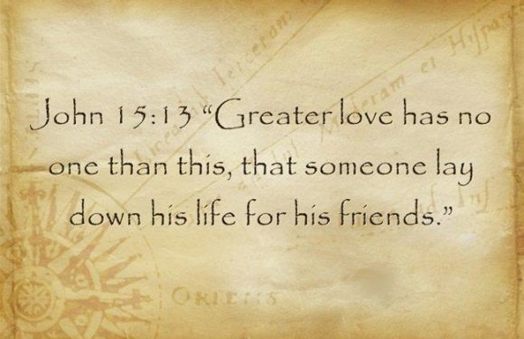 A quote from John 15:13 on a textured, parchment-like background: "Greater love has no one than this, that someone lay down his life for his friends."