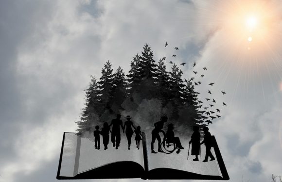 Silhouettes of people walking, including a person in a wheelchair, on an open book with trees and birds in the background, and sunlight shining through clouds.