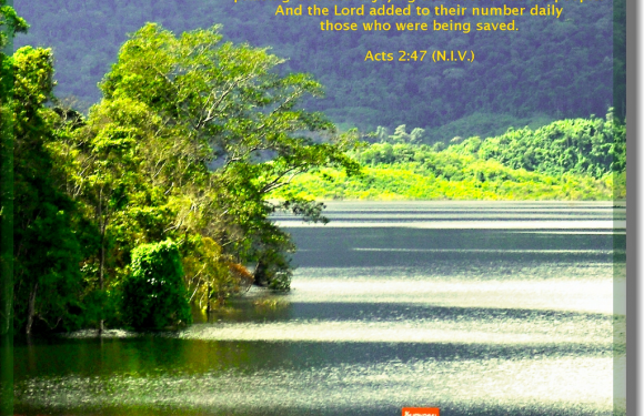 A river scene with lush green trees on the left, calm water reflecting sunlight, distant hills covered in trees, and a colorful graphic overlay with a Bible quote.