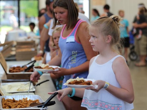 Children eating from buffet