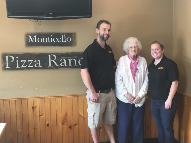 Monticello managers with a longtime guest