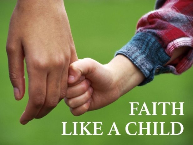 Adult and child holding hands