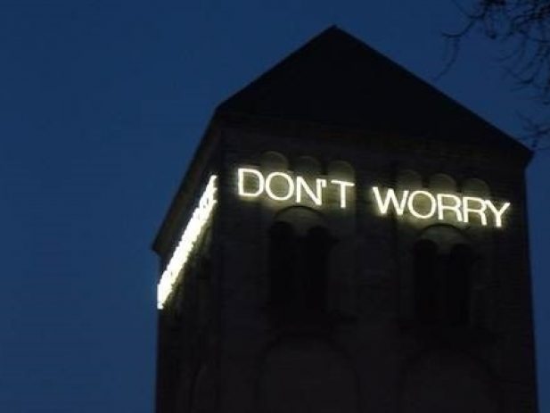 Don't Worry lights on a building at night
